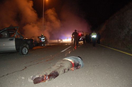 Fotografia de Leo Gonzlez - Galeria Fotografica: ataque a secretaria de Seguridad de Michoacn - Foto: 