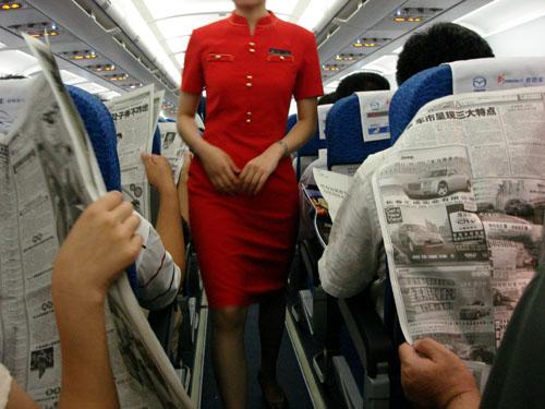 Fotografia de Markel Redondo Fotografo - Galeria Fotografica: El sueo de China - Foto: turistas en  el avion