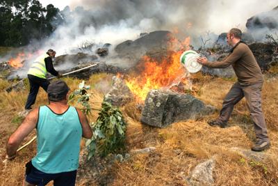 Fotografia de pelu vidal - Galeria Fotografica: ARDE GALICIA - Foto: 